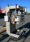 Used Pack West Model Auto 120 capper capable of speeds from 80 - 150 caps per minute. Cap size range: 10mm - 120mm with changeparts.  In-Line Cappe, 6 Quill capper, dual gripper belt, gripper speed c...