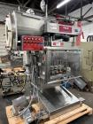 Used Pack West Model Auto 120Left to Right Automatic Inline Spindle Capper. Six (6) quill tighteners. Machine is capable of speeds from 80 to 150 caps per minute. Has a cap size range of 10mm to 120m...