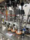 Used Pack West Model Auto 120Left to Right Automatic Inline Spindle Capper. Six (6) quill tighteners. Machine is capable of speeds from 80 to 150 caps per minute. Has a cap size range of 10mm to 120m...