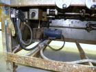 Used Resina In-Line Quill Style Capper, Model NRU-30LH49. (3) Sets of 2 quills, rates up to approximately 300 caps per minute. Adjustable from 10-70mm caps depending on change parts. Includes a pin s...