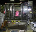 Used Resina Model NRU51 High Speed Automatic Inline Quill Capper. Machine is capable of speeds up to 300 bpm. Cap size range: 10mm to 89mm with changeparts. Equipped with dual belt gripper, H26 exten...