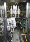 Used Resina Model NRU51 High Speed Automatic Inline Quill Capper. Machine is capable of speeds up to 300 bpm. Cap size range: 10mm to 89mm with changeparts. Equipped with dual belt gripper, H26 exten...