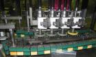 Used Resina Model NRU51 High Speed Automatic Inline Quill Capper. Machine is capable of speeds up to 300 bpm. Cap size range: 10mm to 89mm with changeparts. Equipped with dual belt gripper, H26 exten...