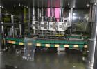 Used Resina Model NRU51 High Speed Automatic Inline Quill Capper. Machine is capable of speeds up to 300 bpm. Cap size range: 10mm to 89mm with changeparts. Equipped with dual belt gripper, H26 exten...