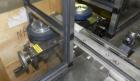 Used Resina Model NRU51 High Speed Automatic Inline Quill Capper. Machine is capable of speeds up to 300 bpm. Cap size range: 10mm to 89mm with changeparts. Equipped with dual belt gripper, H26 exten...