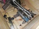 Used Resina Model NRU51 High Speed Automatic Inline Quill Capper. Machine is capable of speeds up to 300 bpm. Cap size range: 10mm to 89mm with changeparts. Equipped with dual belt gripper, H26 exten...