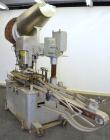 Used Resina Model U-30 Inline Quill Style Capper. Manufacturer rates at up to approximately 250 caps per minute on 13 mm to 38 mm or 43 mm to 70 mm cap size ranges, depending on change parts. This mo...