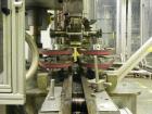 Used Resina Model U40-663 Automatic Inline Capper. Machine is capable of speeds up to 300 caps per minute. Adjustable from 10mm-70mm caps. Has top mounted cap sorter with hopper. Machine has 2HR pin ...