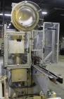 Used Resina Model U40 Automatic Inline Quill Capper. Capable of speeds up to 250 containers per minute. Cap size range 13mm to 70mm (with changeparts). Has 2HR pin style cap sorter, cap chute with no...