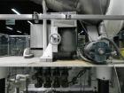 Used Resina Model U40 Automatic Inline Quill Capper. Capable of speeds up to 250 containers per minute. Cap size range: 13mm to 70mm (with changeparts). Currently set up on mm caps. Has 2HR pin style...