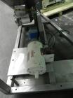 Used Resina Model U40 Automatic Inline Quill Capper. Capable of speeds up to 250 containers per minute. Cap size range: 13mm to 70mm (with changeparts). Currently set up on mm caps. Has 2HR pin style...
