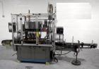 Used Resina Model U40 Automatic Inline Capper. Machine is capable of speeds up to 300 caps per minute. Is a 4 station capper with 8 spindle quills. Adjustable from 10mm-70mm caps. Has top mounted cap...