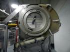 Used Resina Model U40 Automatic Inline Capper. Machine is capable of speeds up to 300 caps per minute. Is a 4 station capper with 8 spindle quills. Adjustable from 10mm-70mm caps. Has top mounted cap...