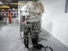 Used Resina Model U40 Automatic Inline Capper. Machine is capable of speeds up to 300 caps per minute. Is a 4 station capper with 8 spindle quills. Adjustable from 10mm-70mm caps. Has top mounted cap...