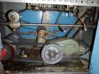 Used Resina Model U40 Automatic Inline Capper. Machine is capable of speeds up to 300 caps per minute. Is a 4 station capper with 8 spindle quills. Adjustable from 10mm-70mm caps. Has top mounted cap...