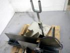 Used Resina Model U40 Automatic Inline Capper. Machine is capable of speeds up to 300 caps per minute. Is a 4 station capper with 8 spindle quills. Adjustable from 10mm-70mm caps. Has top mounted cap...