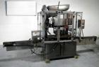 Used Resina Model U40 Automatic Inline Capper. Machine is capable of speeds up to 300 caps per minute. Is a 4 station capper with 8 spindle quills. Adjustable from 10mm-70mm caps. Has top mounted cap...