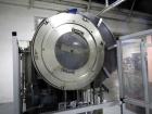 Used Resina Model U40 Automatic Inline Capper. Machine is capable of speeds up to 300 caps per minute. Is a 4 station capper with 8 spindle quills. Adjustable from 10mm-70mm caps. Has top mounted cap...