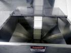 Used Resina Model U40 Automatic Inline Capper. Machine is capable of speeds up to 300 caps per minute. Is a 4 station capper with 8 spindle quills. Adjustable from 10mm-70mm caps. Has top mounted cap...