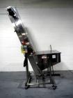 Used Resina Model U40 Automatic Inline Capper. Machine is capable of speeds up to 300 caps per minute. Is a 4 station capper with 8 spindle quills. Adjustable from 10mm-70mm caps. Has top mounted cap...