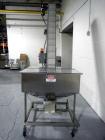 Used Resina Model U40 Automatic Inline Capper. Machine is capable of speeds up to 300 caps per minute. Is a 4 station capper with 8 spindle quills. Adjustable from 10mm-70mm caps. Has top mounted cap...
