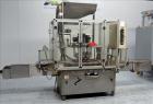 Used- Resina Model UN30 Automatic Inline Quill Screw Capper