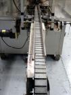 Used- Resina Model UN30 Automatic Inline Quill Screw Capper