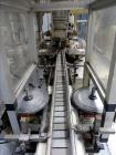 Used Resina Model UN30 Automatic Inline Quill Screw Capper