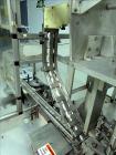 Used Resina Model UN30 Automatic Inline Quill Screw Capper