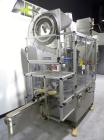 Used Resina Inline Quill Capper, 8 Quill, Model UN40-1250. Capable of speeds over 250 Bottles per minute. Has a cap size range from 13 - 70mm (with changeparts). Has a vertical pin style sorter for c...
