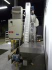 Used Resina Inline Quill Capper, 8 Quill, Model UN40-1250. Capable of speeds over 250 Bottles per minute. Has a cap size range from 13 - 70mm (with changeparts). Has a vertical pin style sorter for c...