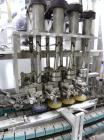 Used Resina Inline Quill Capper, 8 Quill, Model UN40-1250. Capable of speeds over 250 Bottles per minute. Has a cap size range from 13 - 70mm (with changeparts). Has a vertical pin style sorter for c...