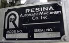 Used Resina Inline Quill Capper, 8 Quill, Model UN40-1250. Capable of speeds over 250 Bottles per minute. Has a cap size range from 13 - 70mm (with changeparts). Has a vertical pin style sorter for c...