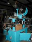 Usedina model U-40 automatic screw capper, 4 quill straight conveyorized dual gripper. Approximate cap range: 13 to 38mm or 43 to 70mm. Approximate speed range: 60-150 per minute. Container range: 1/...
