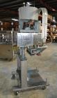 Used Sure Kap SK6000 Quill capper. Three spindle capper with adjustable chute will handle caps from 13 to 110MM w/o changeparts. Has dual gripper belts, C frame construction will mount up to any conv...