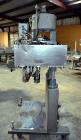 Used Sure Kap SK6000 Quill capper. Three spindle capper with adjustable chute will handle caps from 13 to 110MM w/o changeparts. Has dual gripper belts, C frame construction will mount up to any conv...