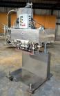 Used Sure Kap SK6000 Quill capper. Three spindle capper with adjustable chute will handle caps from 13 to 110MM w/o changeparts. Has dual gripper belts, C frame construction will mount up to any conv...