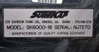 Used Sure Kap SK6000 Quill capper. Three spindle capper with adjustable chute will handle caps from 13 to 110MM w/o changeparts. Has dual gripper belts, C frame construction will mount up to any conv...