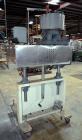 Used Sure Kap SK6000-18 Quill capper. Three spindle capper with adjustable chute will handle caps from 13 to 110MM w/o changeparts. Has dual gripper belts, C frame construction will mount up to any c...