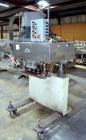 Used Sure Kap SK6000-18 Quill capper. Three spindle capper with adjustable chute will handle caps from 13 to 110MM w/o changeparts. Has dual gripper belts, C frame construction will mount up to any c...