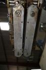 Used Sure Kap SK6000-18 Quill capper. Three spindle capper with adjustable chute will handle caps from 13 to 110MM w/o changeparts. Has dual gripper belts, C frame construction will mount up to any c...