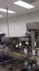 Used SureKap Fully Automatic Straight Line Six Spindle Quill Capper