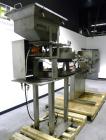 Used SureKap Fully Automatic Straight Line Six Spindle Quill Capper, Model SK6000-SP. Capacities 100 bottles per minute depending on size and conveyor speed. Cap Size Range: diameter 8mm to 110mm (Ma...