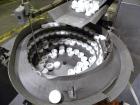 Used SureKap Fully Automatic Straight Line Six Spindle Quill Capper, Model SK6000-SP. Capacities 100 bottles per minute depending on size and conveyor speed. Cap Size Range: diameter 8mm to 110mm (Ma...