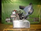 Used White Cap Vacuum Steam Flow Capper, Model VG2200LJG. Includes a cap hopper, and a 4 1/2