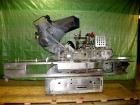 Used White Cap Vacuum Steam Flow Capper, Model VG2200LJG. Includes a cap hopper, and a 4 1/2