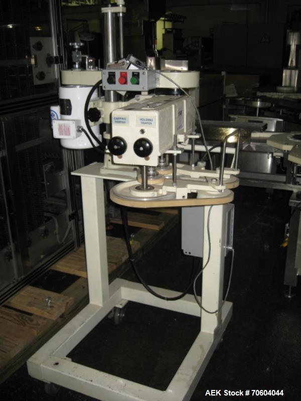Used Roll Tite Cap Torquer with .5 hp, 110 volt motor, serial #835-01.