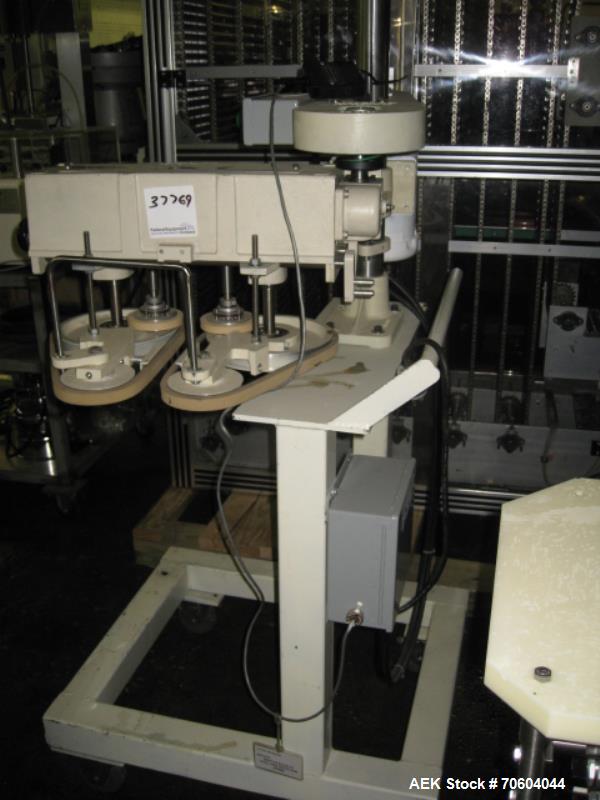 Used Roll Tite Cap Torquer with .5 hp, 110 volt motor, serial #835-01.