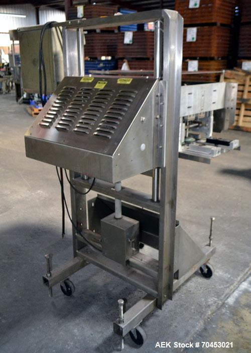 Used ELF ACT600L Automatic cap tightener. (6) Quill, rated up to 100 containers per minute. Cap size range 10mm-110mm diameter. Single belt unit C frame design. Mounted on casters. SELLING PRICE, AS ...