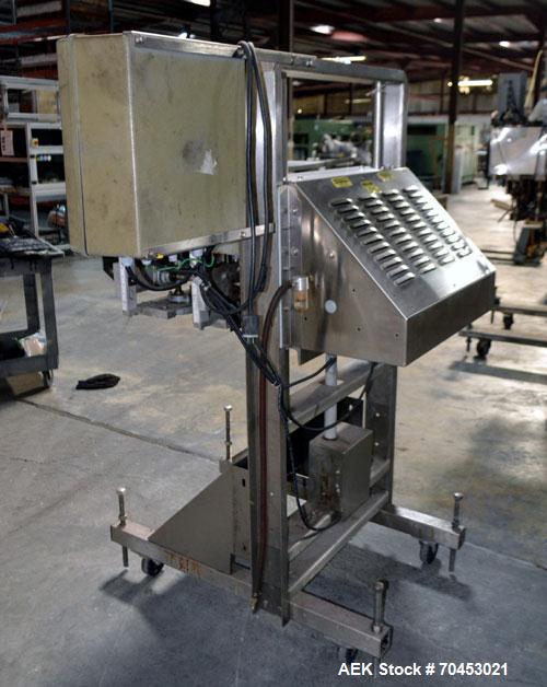 Used ELF ACT600L Automatic cap tightener. (6) Quill, rated up to 100 containers per minute. Cap size range 10mm-110mm diameter. Single belt unit C frame design. Mounted on casters. SELLING PRICE, AS ...